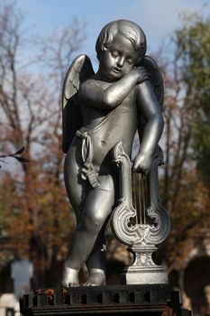 Detail of a mourning sculpture on a Mirogoj cemetery in Zagreb, Croatia