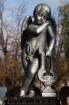 Detail of a mourning sculpture on a Mirogoj cemetery in Zagreb, Croatia