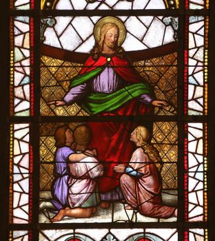 Jesus friend of children, stained glass window in the Church of St. Vincent de Paul in Zagreb, Croatia