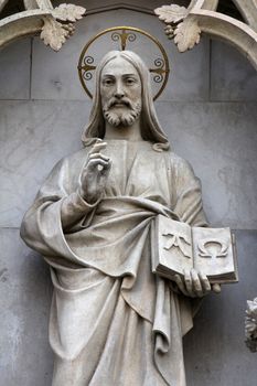 Statue of Christ the Teacher on the portal of the cathedral dedicated to the Assumption of Mary in Zagreb