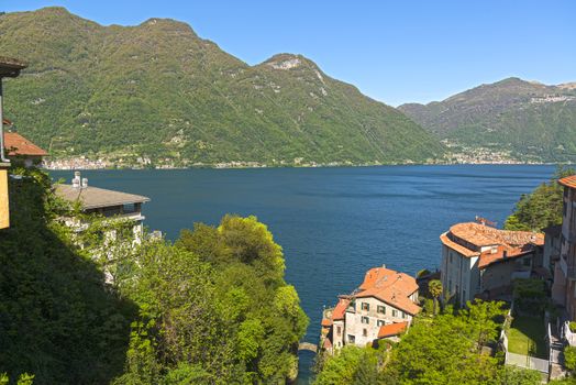 Landscape on the Como Lake in a clear morning of spring season