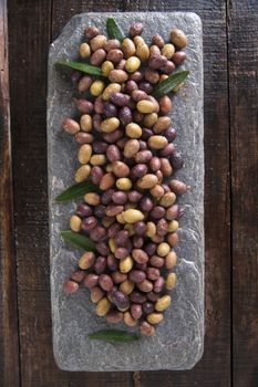 Aperitif with mixed olives in brine of Tuscany Italy