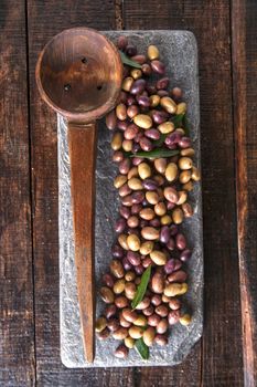 Aperitif with mixed olives in brine of Tuscany Italy