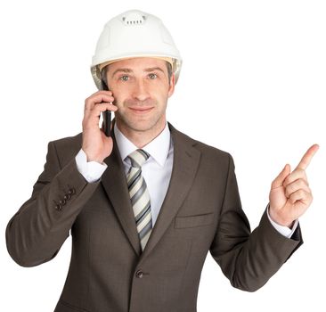 Architect in helmet talking on phone and raising finger up. White background