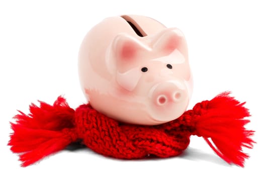 Poor state of finances, Piggy bank with red scarf isolated on white