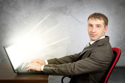 Smile young businessman use laptop at home, healthy lifestyle concept, screen of laptop shine rays of light