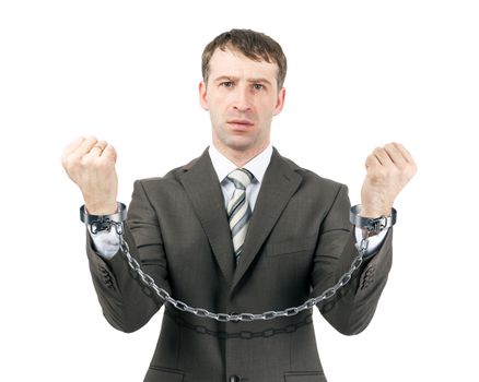 Business man wearing suit in handcuffs isolated on white