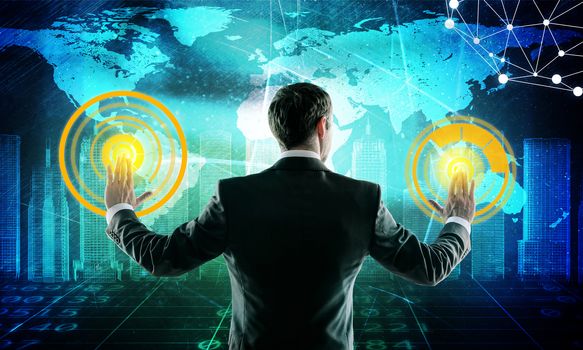 Businessman in suit push digital screen with icons, world map and wire-frame buildings. E-business concept