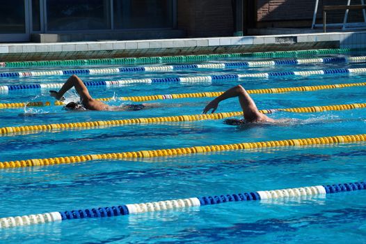 swimmer in the big outdoor swimming pool