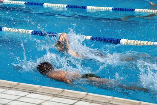 Heat of children on one path in the swimming pool