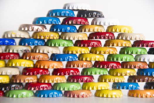 Multicolored set of metal bottle caps for beverages