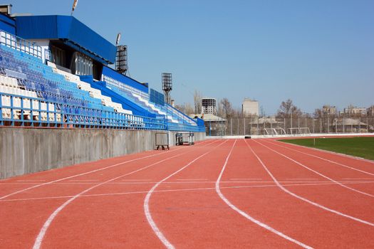 Rubber racetrack at old small stadium