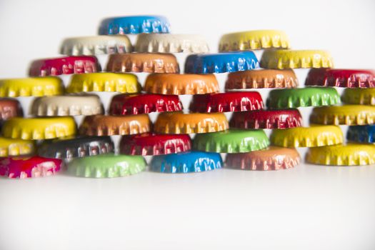 Multicolored set of metal bottle caps for beverages