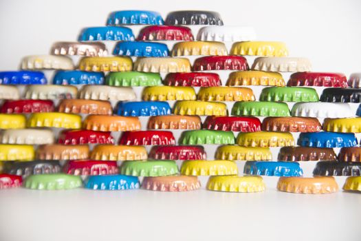 Multicolored set of metal bottle caps for beverages