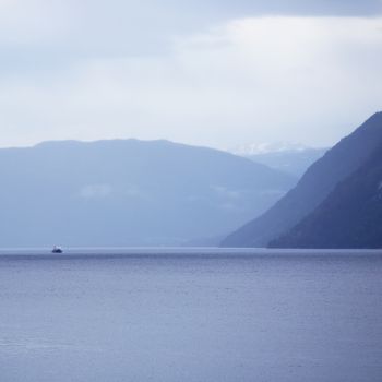 View on Tinnsja lake and forest at nasty summer day