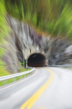 Blurred motion background of road tunnel in Norway