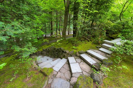 Granite stone stair steps at Japanese Garden in lush green landscape