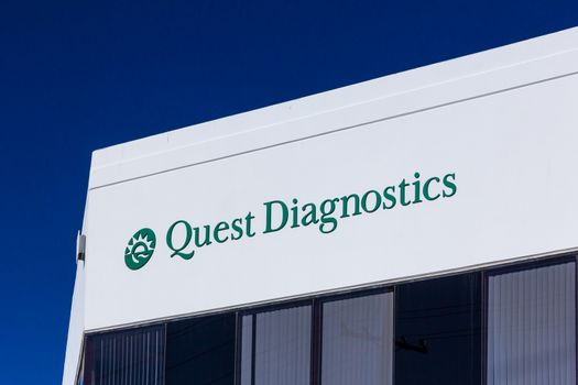 VALENCIA CA/USA - DECEMBER 26, 2015: Quest Diagnostics exterior and logo. Quest Diagnostics Incorporated is a corporation that provides clinical laboratory services.