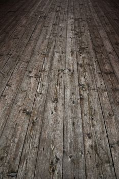 Old vintage rustic aged antique wooden sepia surface with gaps in perspective and shaded sides