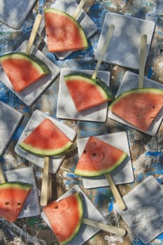 Presentation of a summer dish made up of slice of watermelon 