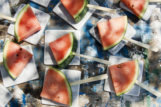 Presentation of a summer dish made up of slice of watermelon 