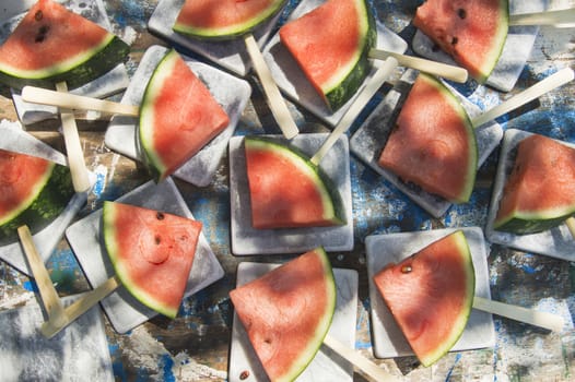 Presentation of a summer dish made up of slice of watermelon 