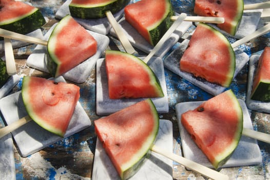 Presentation of a summer dish made up of slice of watermelon 