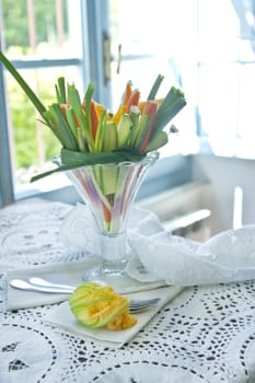 Preparation and presentation of mixed vegetables for garnish 