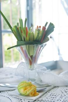 Preparation and presentation of mixed vegetables for garnish 