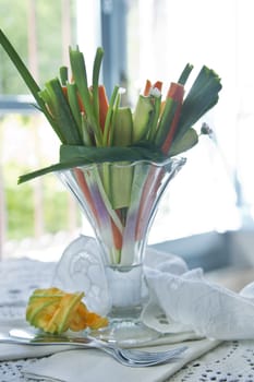 Preparation and presentation of mixed vegetables for garnish 