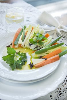 Preparation and presentation of mixed vegetables for garnish 