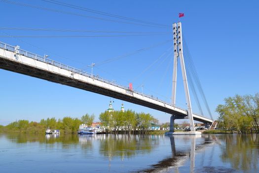 The pedestrian cable-stayed bridge on the Tura River in the city of Tyumen, Russia. May, 2016