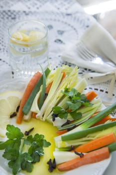 Preparation and presentation of mixed vegetables for garnish 