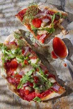 Pizza base with whole wheat flour with arugula and onion 

