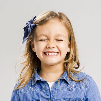 Portrait of a little girl with a smiling expression