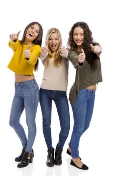 Group of teenage friends with thumbs up