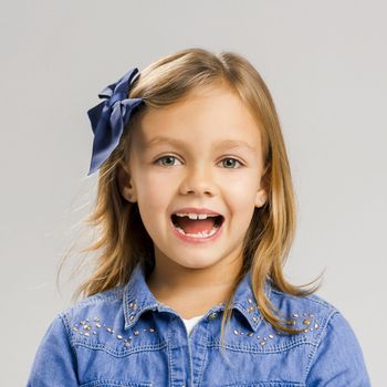 Portrait of a little girl with a smiling expression