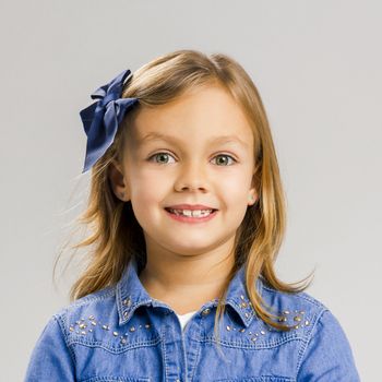 Portrait of a little girl with a smiling expression