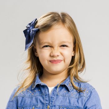 Portrait of a little girl with a smiling expression