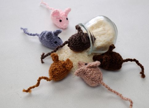 Funny concept from handmade product, group of tiny mice eat rice, amazing animals toys for kid, knitted rats knit from yarn