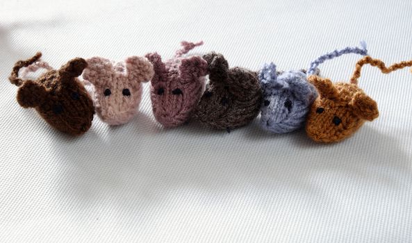 Funny concept from handmade product, group of tiny mice eat rice, amazing animals toys for kid, knitted rats knit from yarn