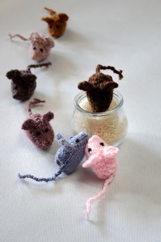 Funny concept from handmade product, group of tiny mice eat rice, amazing animals toys for kid, knitted rats knit from yarn