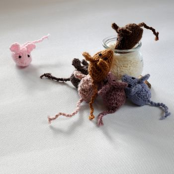 Funny concept from handmade product, group of tiny mice eat rice, amazing animals toys for kid, knitted rats knit from yarn