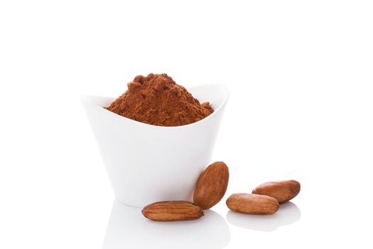 Cocoa beans and cocoa powder on white background. Healthy superfood.