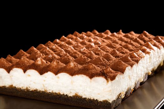 Delicious tiramisu dessert isolated. Traditional italian sweet dessert.