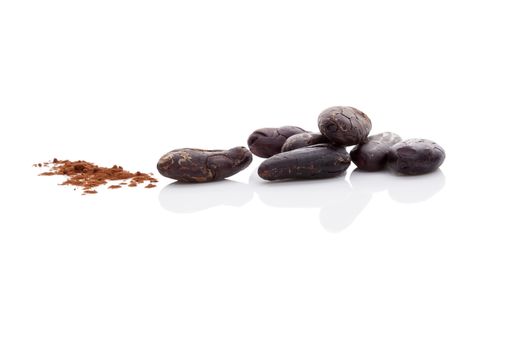 Cocoa beans and cocoa powder isolated on white background. Healthy superfood.