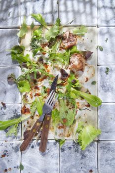 What remains at the end of a dish of vegetables and meat