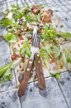 What remains at the end of a dish of vegetables and meat