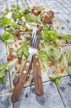 What remains at the end of a dish of vegetables and meat