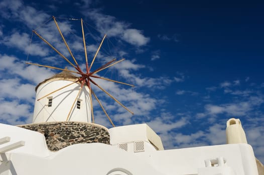 View of Oia windmill at the Island Santorini, Greece. Copyspace.